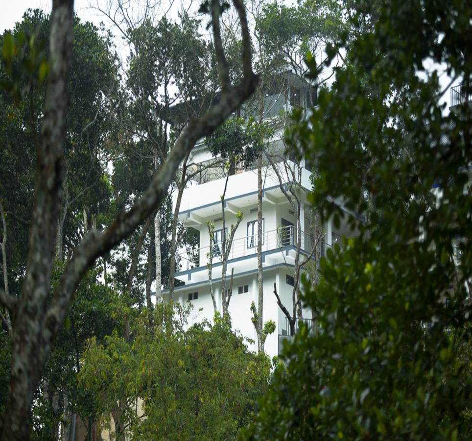 Hostess Thekkady Hotel Buitenkant foto