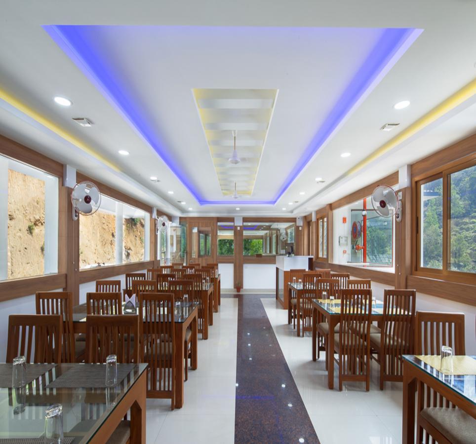 Hostess Thekkady Hotel Buitenkant foto