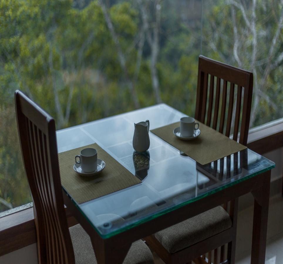 Hostess Thekkady Hotel Buitenkant foto